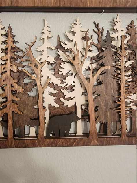 An open back design allows beautiful tree like shadows to appear on your wall behind it. The measurements for are : Extra Small - 8" x 5" Small - 17.75 x 10.75" Medium - 19" x 12" Large - 23.75" x 14.25" Other animals available on request. This is laser cut, multilayer wood art. It's made with Baltic Birch and each layer is stained a different color. It is 7 layers and each layer is 1/8". There is a Sawtooth mount on back. This is made to order, so please allow 5 days for us to make it before we Wooden Mountain Wall Art Long, Deer Wood Art Print, Nature Inspired Wood Art, Wood Artwork Forest, Wooden Wall Art Cricut, In Lay Wood Art, Wood Art Pyrography, Lodge Wall Display, Wood Crafts Artwork