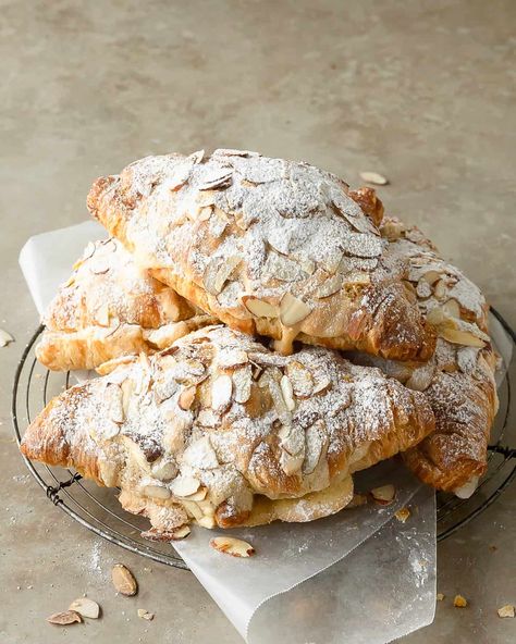 Almond croissants are an easy to make version of the classic french pastry, croissants aux amandes. This quick almond croissant recipe uses day old store bought croissants, filled with a homemade almond pastry cream, topped with a sweet almond syrup. Skip the fancy french bakery and make these buttery almond filled croissants for the perfect breakfast or brunch treat. French Crissonts Recipe, St Martins Croissant, Fancy Croissant Recipe, Almond Crescent Rolls, Almond Croissants Recipe, Healthy Breakfast Pastry, Almond Filling For Croissants, Almond Crossiant Recipes, Crissonts Recipe