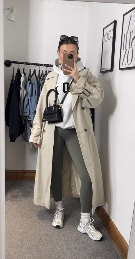 Womens Long Trench Coat, Trench Coat Outfit New Balance, Trench With Leggings, Sweatshirt Trench Coat Outfit, Sporty Trench Coat Outfit, New York Trench Coat Street Styles, Stone Trench Coat Outfit, Winter Outfits With Trench Coats, Comfy Trench Coat Outfit