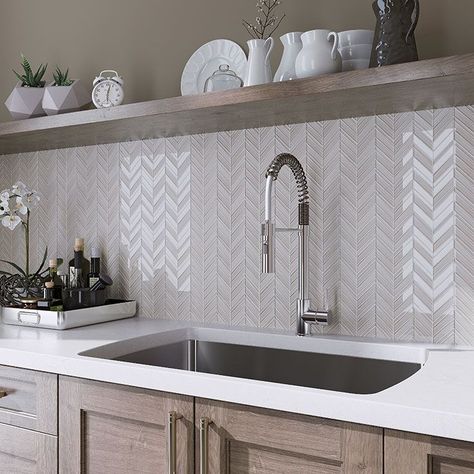 Glass backsplash tile is protective, low maintenance, and visually appealing all at once Chevron Backsplash, Trendy Kitchen Backsplash, Chevron Tile, Elegant Tiles, Glass Tile Backsplash, Kitchen Backsplash Designs, Timeless Kitchen, Glass Backsplash, Backsplash Designs