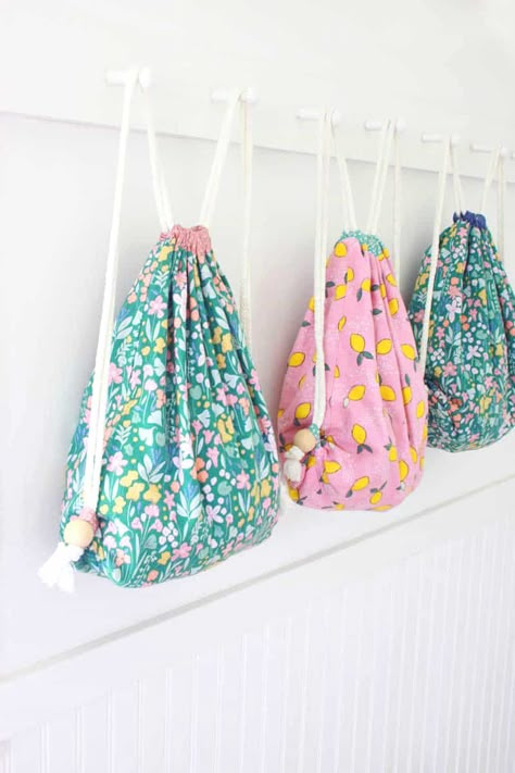 How To Sew A Drawstring Backpack - Easy Tutorial With Pictures Diy Drawstring Backpack Pattern, Easy Sewing Backpack, Diy Drawstring Bag Backpack, How To Sew A Drawstring Backpack, Sew Very Easy With Laura, Kids Drawstring Bag, How To Sew Backpack, Easy Backpack Sewing Pattern, Draw String Backpack Pattern Free