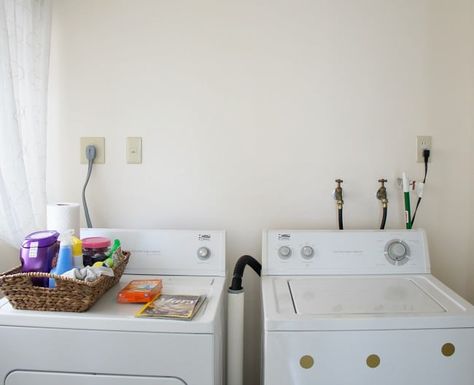 hide cords and hoses in the laundry room with this easy DIY Cover Hoses In Laundry Room, How To Hide Hoses In Laundry Room, How To Hide Washing Machine Hoses, Laundry Hose Cover, Hiding Laundry Room Hookups, Hidden Laundry Rooms, Basement Laundry Room Makeover, Dryer Hose, Hide Pipes