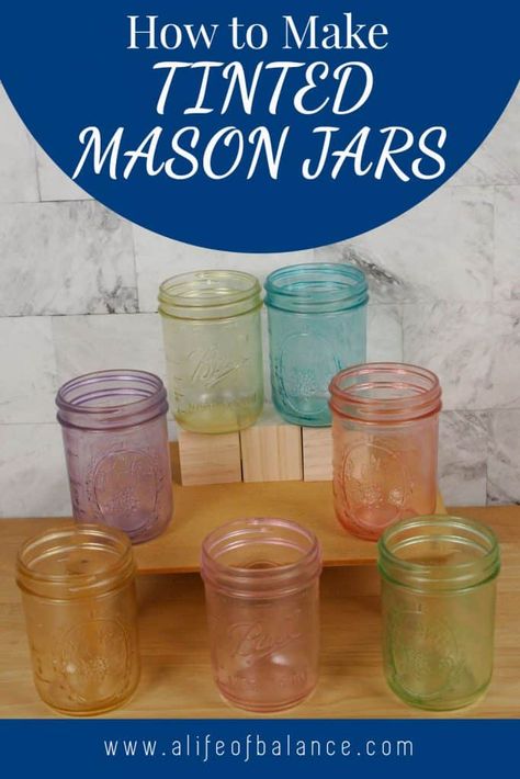 I just love using colored glass jars in to decorate my home. They can be used in so many different ways. Fill them with flowers, candy, pasta or seashells to add a splash of color to any spot in your home. Here is how to make tinted mason jars using food coloring and mod podge. I’ll teach you how to apply mod podge without streaks and how to make the jars so that they can have water in them without diluting the color. This is an easy craft that you can decorate with year-round. How To Color Tint Mason Jars, How To Tint Mason Jars, How To Color Mason Jars, Color Mason Jars Diy, Painting Jars Diy, How To Make Colored Glass Jars, Tinting Glass Jars Diy, Color Glass Diy, How To Color Glass Jars