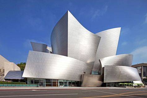 Walt Disney Concert Hall – Los Angeles Gehry was shortlisted to devise a new home for the Los Angeles Philharmonic in 1988; the project, the Walt Disney Concert Hall, finally opened in 2003. Today critics and the public agree that the iconic building was worth the wait. inside, similarly shaped panels of Douglas fir line the auditorium.  Photo: JRC/Alamy Frank Gehry Architecture, Gehry Architecture, Deconstructivism, Walt Disney Concert Hall, Vitra Design Museum, Jean Nouvel, Rem Koolhaas, Vitra Design, Frank Gehry