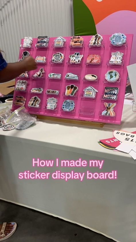 My DIY sticker display board courtesy of @Smile Cult’s tutorial 🫶🏾 r... | Diy Stickers | TikTok Pvc Display Craft Booths, Craft Booth Sticker Display, Best Vendor Booth Ideas, Display Stickers For Sale, Craft Booth Setup Ideas, Sticker Vendor Booth Display Ideas, Sticker Display Ideas Retail Diy, Pegboard Sticker Display, Ways To Display Stickers For Sale