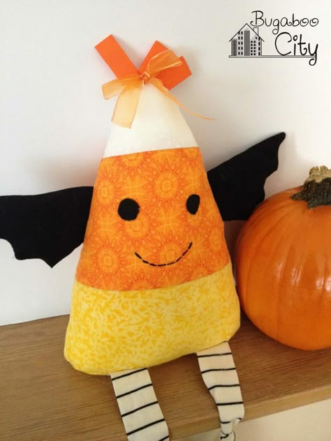 Create a cute candy corn stuffie for Halloween using this free sewing pattern! A fun gift for little ones or a sweet decoration for your home! Halloween Sewing Crafts, Corn Crafts, Halloween Sewing Patterns, Candy Corn Crafts, Halloween Fabric Crafts, Halloween Sewing Projects, Halloween Crafts To Sell, Candy Corn Decorations, Fall Sewing Projects