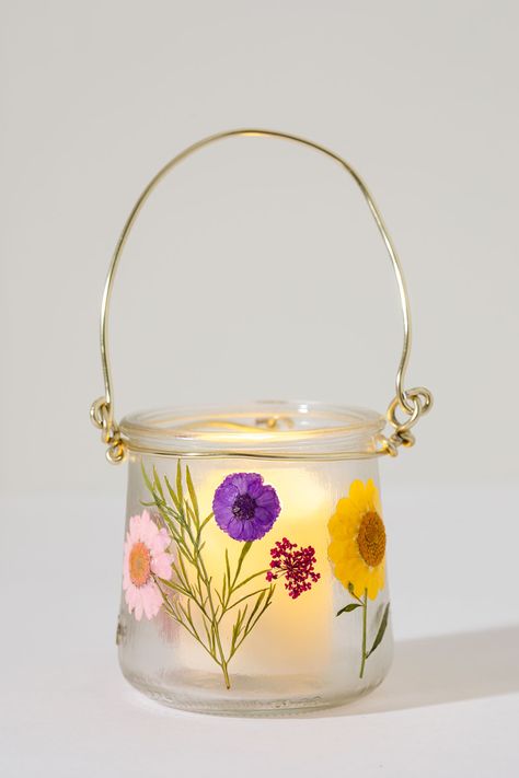 How to Make Pressed Flower Jar Lanterns - Kippi at Home Pressed Flower Glass Jar, Diy Jars Painting Aesthetic, Glass Jar Art Ideas, What To Do With Oui Jars, Crafts With Yogurt Jars, Oui Yogurt Jar Crafts, Oui Spice Jars, Things To Put In Jars For Decoration, Paper Dandelion Diy