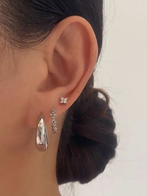 Chunky Silver Earrings Stack, Teardrop Earrings Silver, Cute Silver Earring Stacks, Earring Sets Silver, Ear Piercings Silver Aesthetic, Two Ears Piercings, Earrings Hoops Silver, 3 Ear Piercings Silver, Sliver Earing Ideas