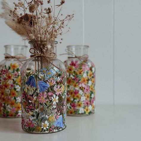 Steph & Sam on Instagram: "Set a reminder for Mothers Day so you don’t miss out on grabbing one of our lovely hand painted floral vases, last chance to order is Monday 13th March to guarantee delivery. 🌸 Just add a small bundle of flowers along with a vase and you’ve bagged yourself some brownie points this year 🥰" Painting Flowers On Glass Jars, Clear Vase Painting, Hand Painted Glass Jars, Clear Vase Painting Ideas, Painting Glass Vases Diy, Painting A Glass Vase, Hand Painted Jars, Hand Painted Vases Diy Ideas, Painting On Vase