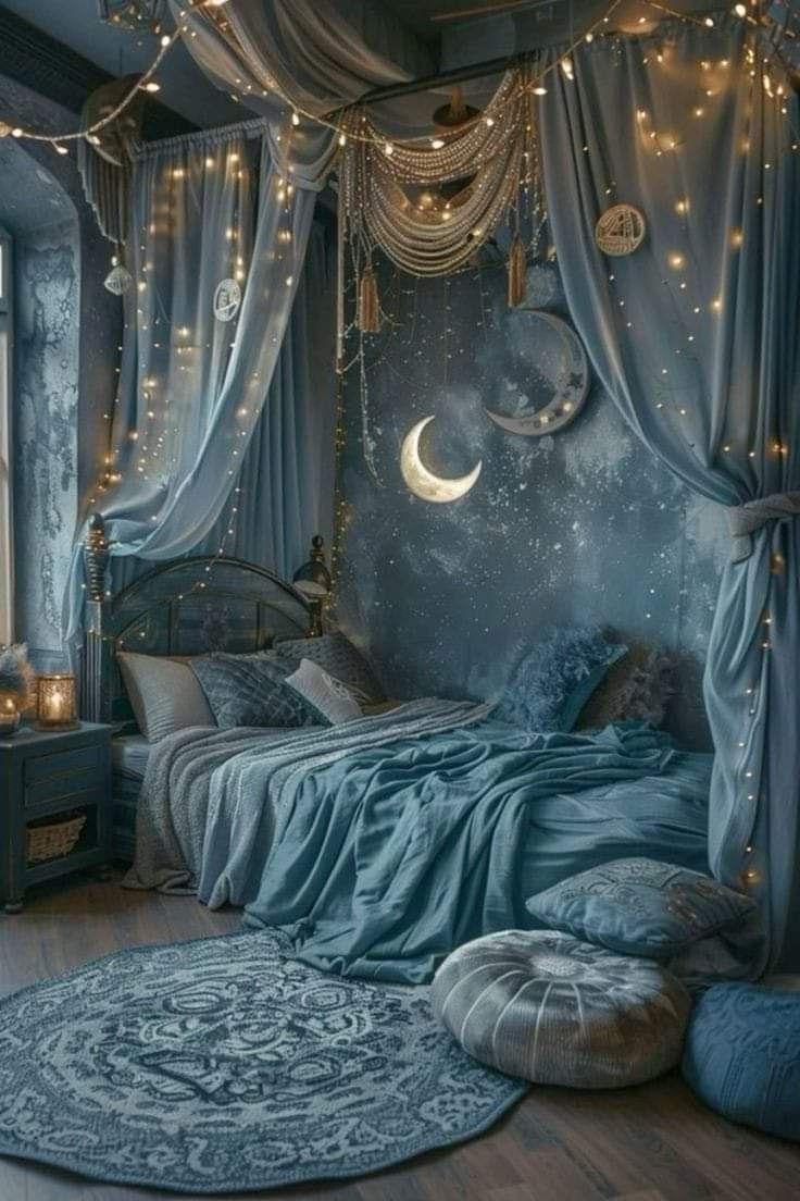 a bedroom with blue walls, curtains and lights on the ceiling is lit up by string lights