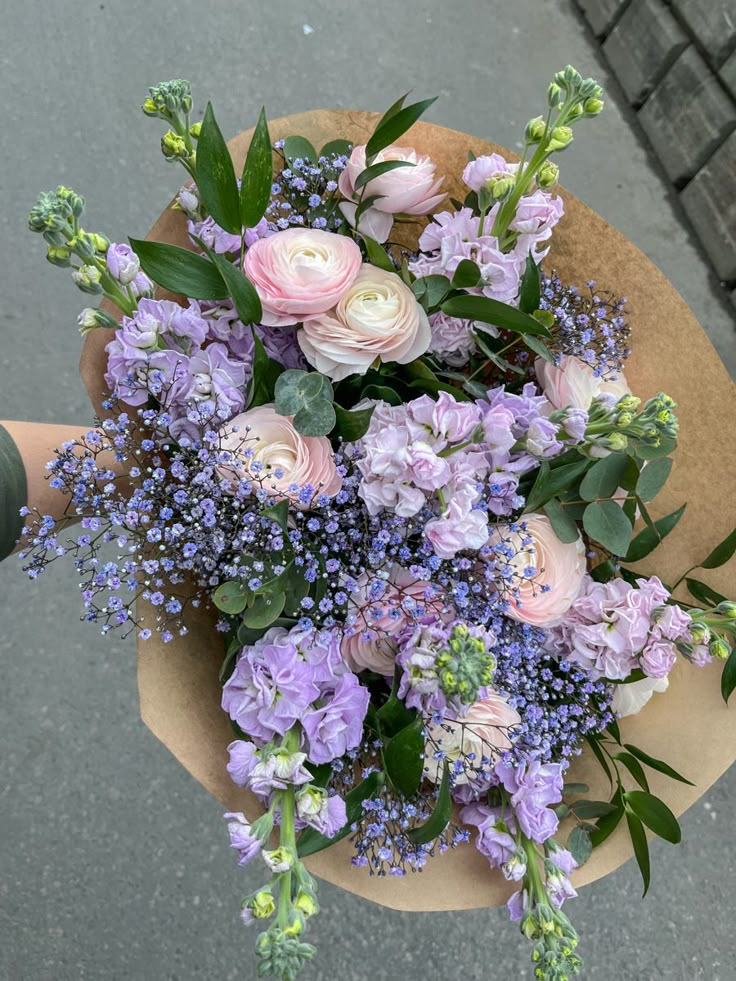 a bouquet of flowers sitting on top of a table