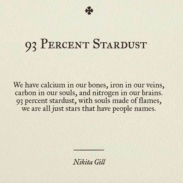 a white card with the words 99 percent stardust written in black ink on it