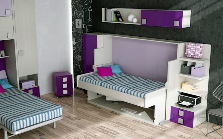 a bedroom with purple and white furniture in it