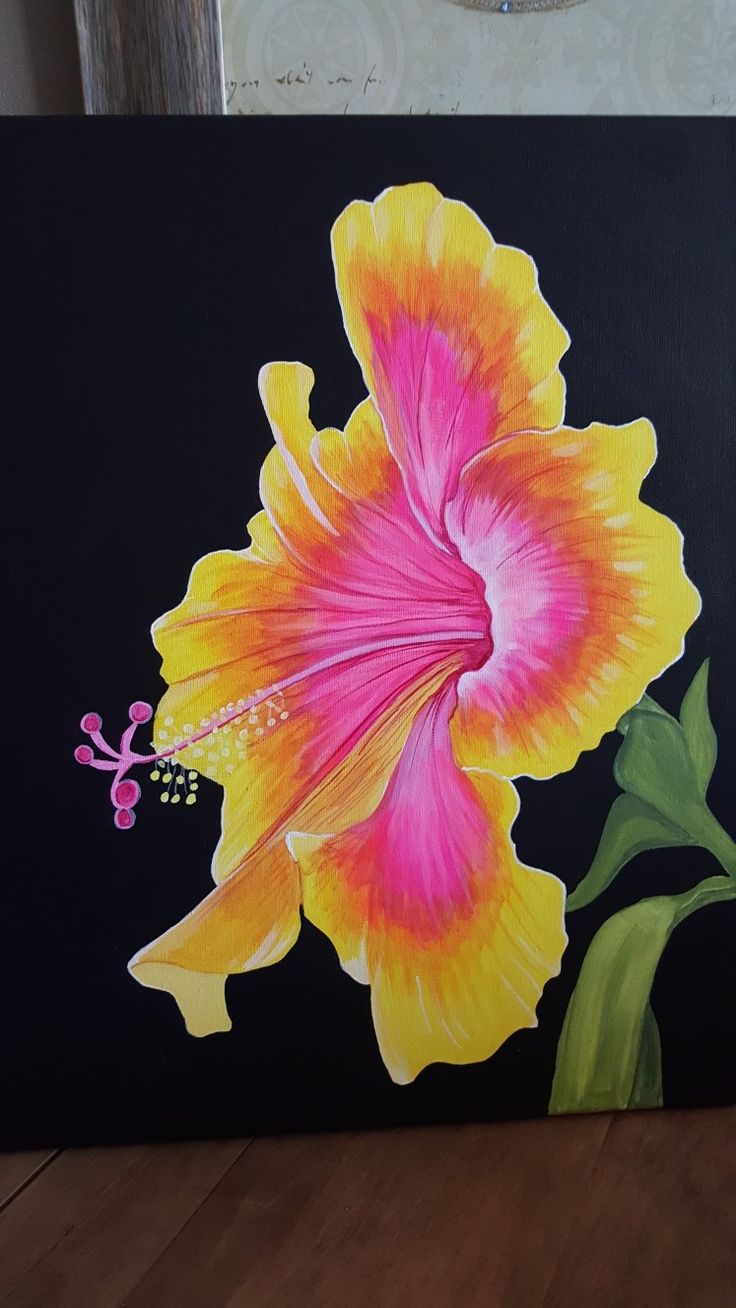 a painting of a pink and yellow flower on a black background