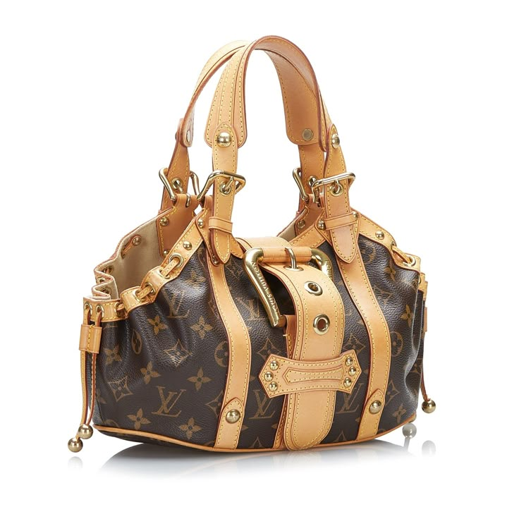 This Louis Vuitton Theda PM was made from Monogram Canvas. The Bag features brown vachetta leather trim, handles and straps, gold stud and buckle details, side drawstrings, a flat strap over the top opening with a gold buckle closure, and an interior compartment. The Bag is worn in the arm or in the hand. Sac Louis Vuitton, Pm Monogram, Dream Bags, Pretty Bags, Virgil Abloh, Gold Stud, Cute Bags, Vuitton Bag, Sierra Leone