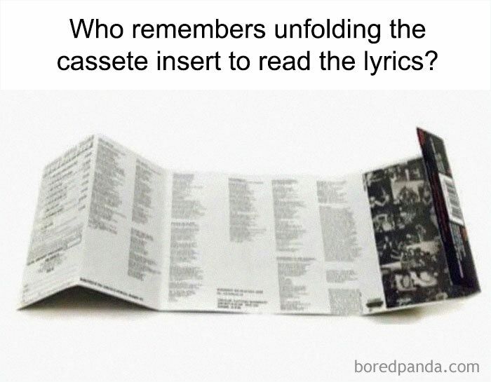 an open book with the words who remembers unfolding the cassette insert to read the lyrics?