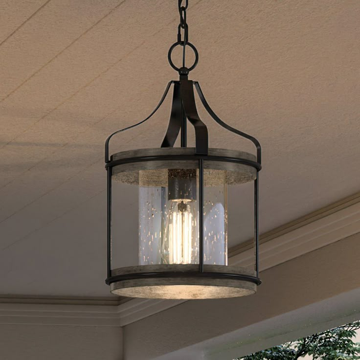 a light fixture hanging from the ceiling in a house