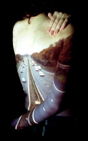 a woman with her arm painted like a highway