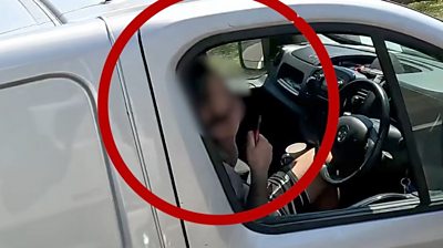 Man shaving whilst driving