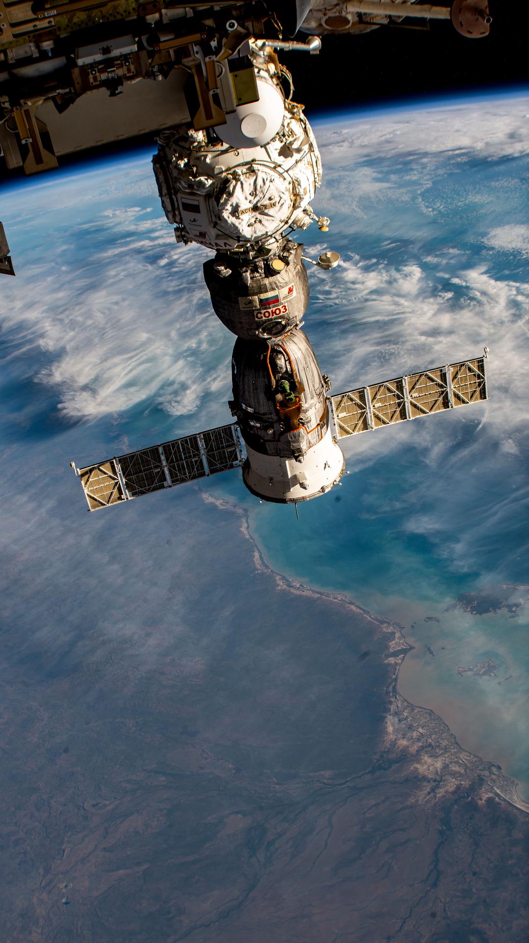 The space station orbits above Queensland, Australia.