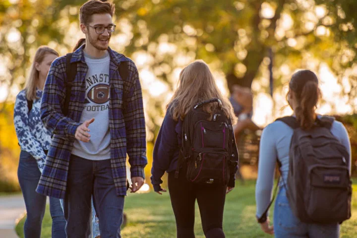 Photo of students walking on campus