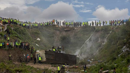 Nepal plane crash kills 18: Rescuers dig through wreckage at accident site