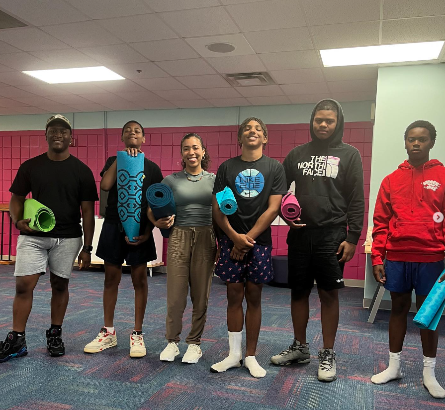 boys standing with yoga mats, survivor services, YWCA DAYTON