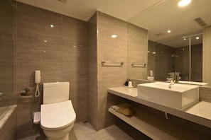 Standard Quadruple Room, 2 Queen Beds, No Windows | Bathroom | Separate bathtub and shower, hair dryer, slippers, towels