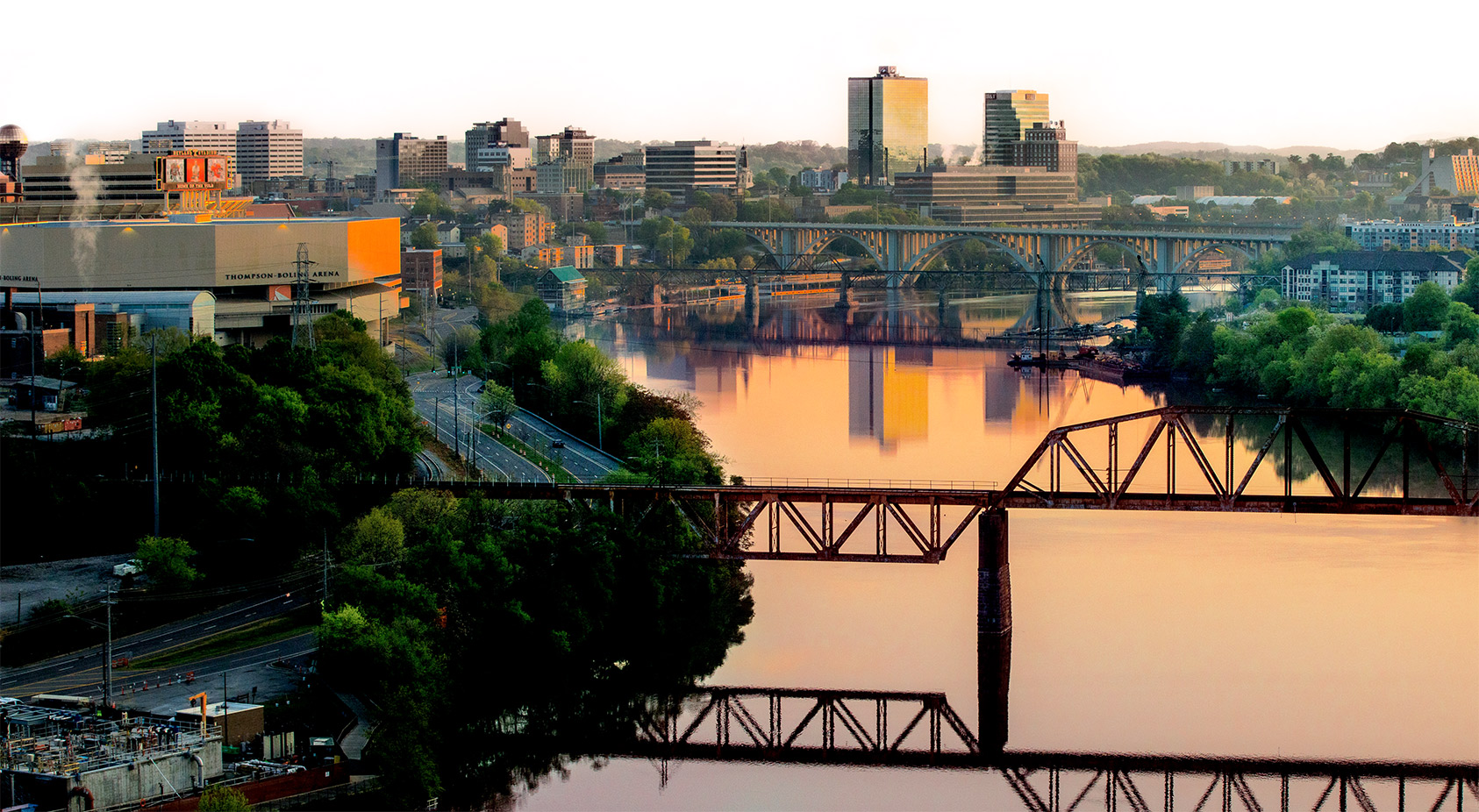 sunset over the Tennessee River that surrounds campus