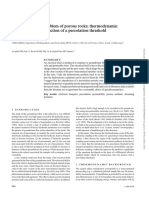 The Hydroelectric Problem of Porous Rocks: Thermodynamic Approach and Introduction of A Percolation Threshold