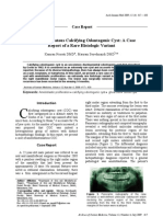 Ameloblastomatous Calcifying Odontogenic Cyst: A Case Report of A Rare Histologic Variant