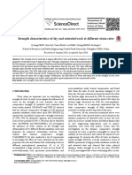 Strength Characteristics of Dry and Saturated Rock at Different Strain Rates