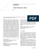 Bearing Capacity of Strip Footings Near Slopes