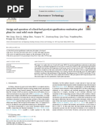 Design and Operation of A Fixed-Bed Pyrolysis-Gasification-Combustion Pilot Plant For Rural Solid Waste Disposal