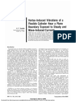 Vortex-Induced Vibrations of A Flexible Cylinder Near A Plane Boundary Exposed To Steady and Wave-Induced Currents