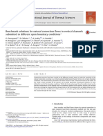 Benchmark Solutions For Natural Convection Flows in Vertical Channels Submitted To Different Open Boundary Conditionsq