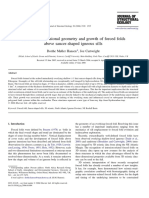 The Three-Dimensional Geometry and Growth of Forced Folds Above Saucer-Shaped Igneous Sills