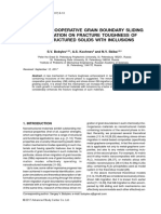 Effect of Cooperative Grain Boundary Sliding and Migration On Fracture Toughness of Nanostructured Solids With Inclusions