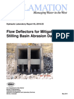 Flow Deflectors For Mitigation of Stilling Basin Abrasion Damage