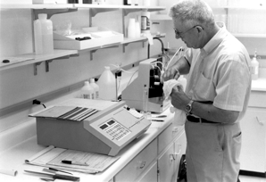 Clifford Hach working in lab