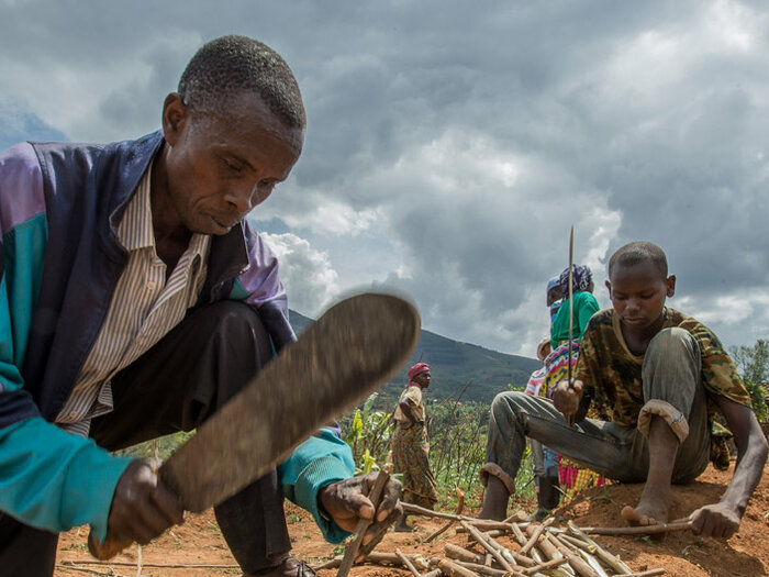 community working on land