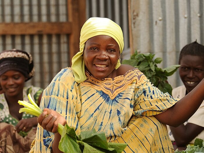 woman selling vegetables