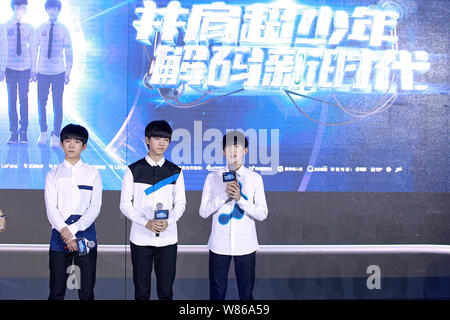 (From left) Yiyang Qianxi, Wang Junkai and Wang Yuan of Chinese boy group TFBoys attend a launch event for their new web drama 'Finding Soul' in Beiji Stock Photo