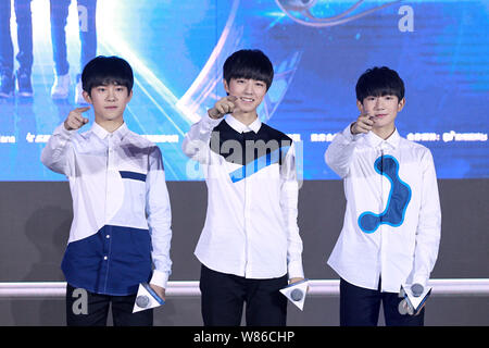 (From left) Yiyang Qianxi, Wang Junkai and Wang Yuan of Chinese boy group TFBoys attend a launch event for their new web drama 'Finding Soul' in Beiji Stock Photo