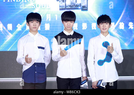 (From left) Yiyang Qianxi, Wang Junkai and Wang Yuan of Chinese boy group TFBoys attend a launch event for their new web drama 'Finding Soul' in Beiji Stock Photo