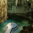 Man enjoying the view of Suytun Cenote from the top Yucatan Mexico North America; Shutterstock ID 1657947103; purchase_order: 65050 - Digital Destinations and Articles; job: Lonely Planet Online Editorial; client: Best cenotes in Mexico; other: Brian Healy
1657947103
adventure, america, ancient ruins, architecture, beach, beautiful destinations, beauty in nature, calavera, cancun, cenotes, chichen itza, civilization, clouds, coba, experience, explore, historical, ikkil, isla mujeres, landmark, landscape, magnificient, marine life, mexican, mexico, natgeotravel, nature, north america, outdoors, photography, planetearth, playa del carmen, scenary, scuba, sea life, seven wonder of the world, sky, suytun, tourism, travel, travel destinations, tulum, turquoise water, underwater, vacation, yucatan
Man enjoying the view of Suytun Cenote from the top Yucatan Mexico North America