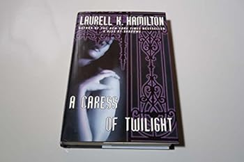 Hardcover A Caress of Twilight (Meredith Gentry, Book 2) Book