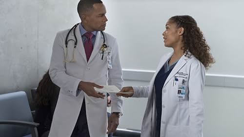 Hill Harper and Antonia Thomas in The Good Doctor (2017)