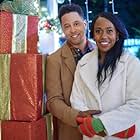 Rukiya Bernard and Antonio Cayonne in Christmas in Evergreen: Bells Are Ringing (2020)