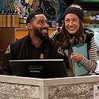 Elizabeth Ho and Tone Bell in Disjointed (2017)